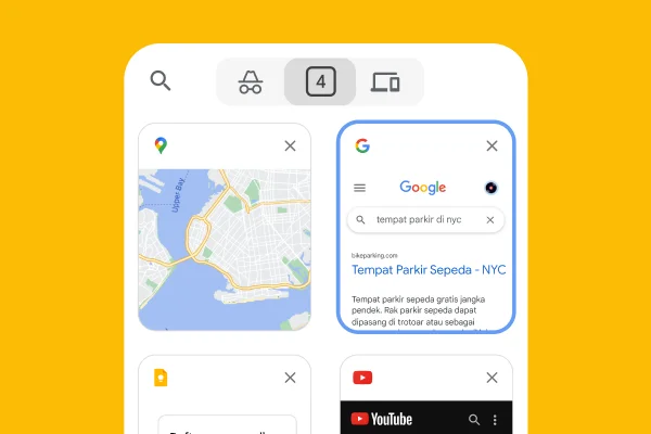 Browser seluler memuat tab dari browser desktop, termasuk Google Maps dan info parkir NYC.